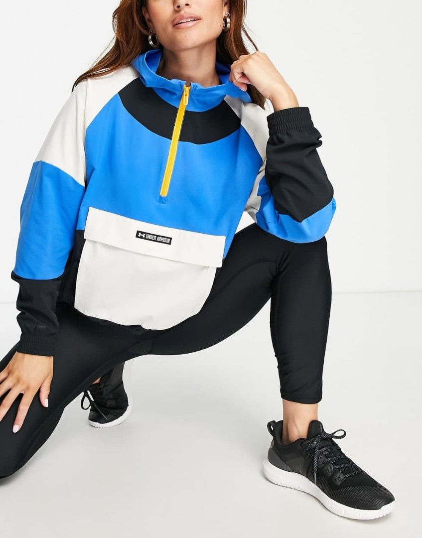 Under Armour Colorblock Anorak Jacket (Category: Coats, Jackets and Outerwear) located in Valencia. Submitted by cabisaythriftshop (Listing ID 1463414051, Image 1). Description: Under Armour Training woven hooded jacket in blue colourblock Small-Medium 23L*21W As new.