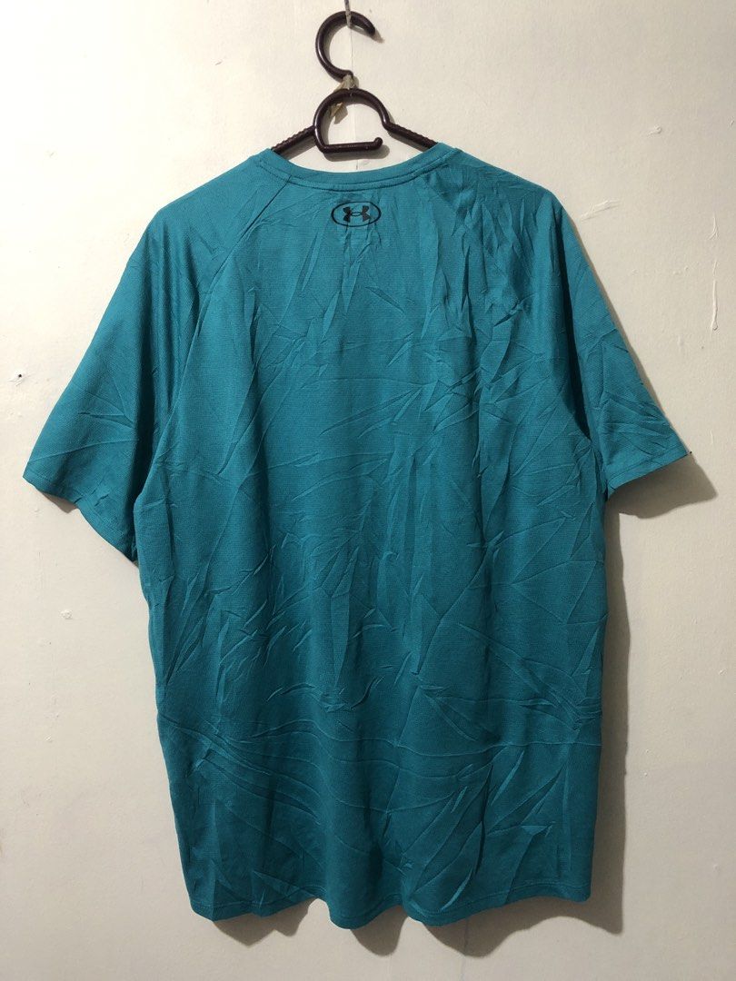 Under Armour Shirt (Category: Earphones) located in Manila. Submitted by raremountain00 (Listing ID 1463527453, Image 2). Description: Authentic Excellent condition No issue.