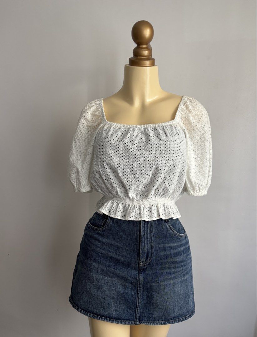 Uniqlo eyelet puffsleeve top (Category: Blouses) located in Quezon City. Submitted by swift_kenjie (Listing ID 1463346121, Image 2). Description: Uniqlo eyelet puffsleeve shirt Medium on tag super ganda nito very good condition (color may vary due to lighting) -Preloved and Trifted. These are all handpicked so expect very good to like new condition -Miners via pm is allowed Mine now pay now (First to pay gets the item) -Gcash payment only (Paymen