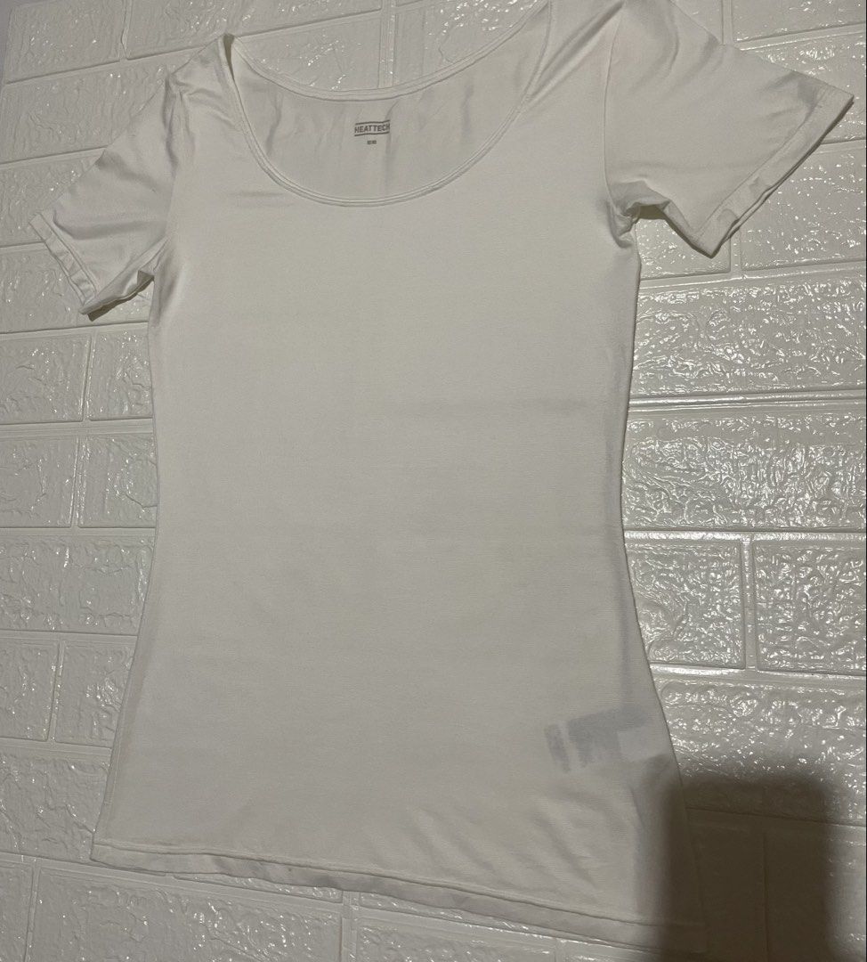 UNIQLO HEATTECH TShirt Scoop Neck (Category: Shirts) located in Marilao. Submitted by clear_out_closet (Listing ID 1463497560, Image 3). Description: Item Details: 👇 • Brand: UNIQLO (HEATTECH) • Color: White • Material: 38% Polyester, 31% Acrylic, 21% Rayon, 10% Spandex • Country of Origin: Made in Indonesia • Sizing: Tagged Women’s M (160/90 / Bust 80-86cm) • Style / Model Code: 271-428492(04-11) / 03-27-0F003E / 1343-0DDA-DDB • Additional Labe