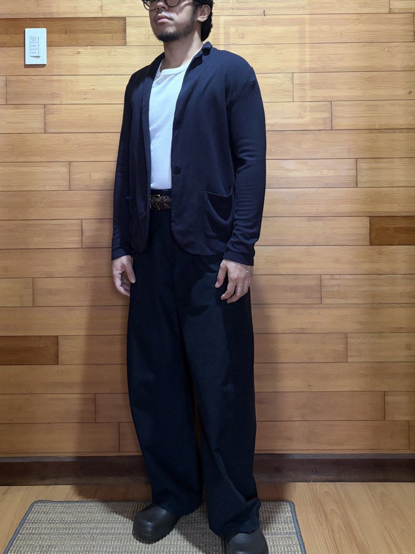 Uniqlo Navy Blue Cardigan (Category: Coats, Jackets and Outerwear) located in Las Pinas. Submitted by cmrqz (Listing ID 1463375506, Image 1). Description: - Navy blue cardigan - Single button closure - Two front pockets - Good as new.
