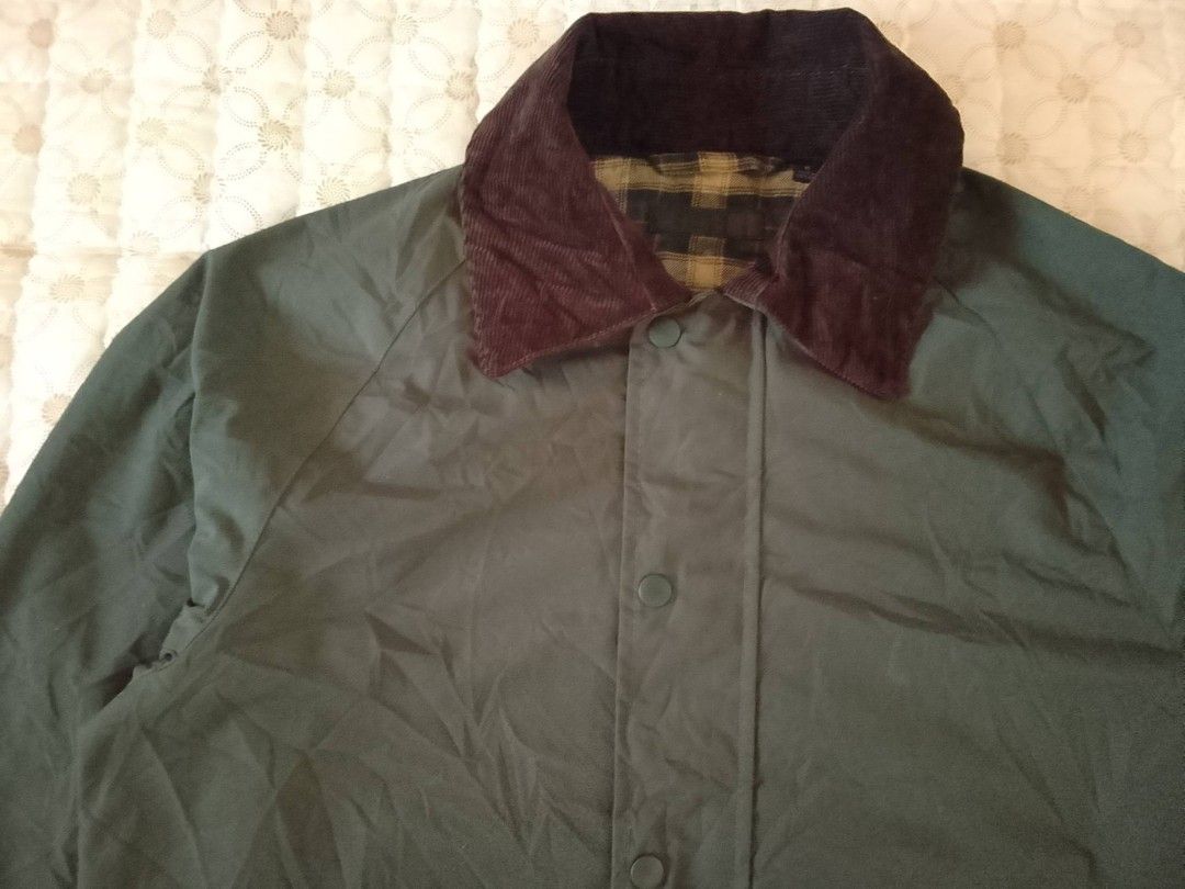 Uniqlo Olive Hunting Jacket Cords Collar (Category: Coats, Jackets and Outerwear) located in Zamboanga. Submitted by nurbya898048 (Listing ID 1463390724, Image 3). Description: - Classic dark green jacket - Corduroy collar - Plaid lining - Two front pockets with button closure - Snap button front - Ideal for cooler weather - Versatile style Tag size medium Width 22 Length 29 Excellent condition Presentable, no flaws Check all photos for details 1