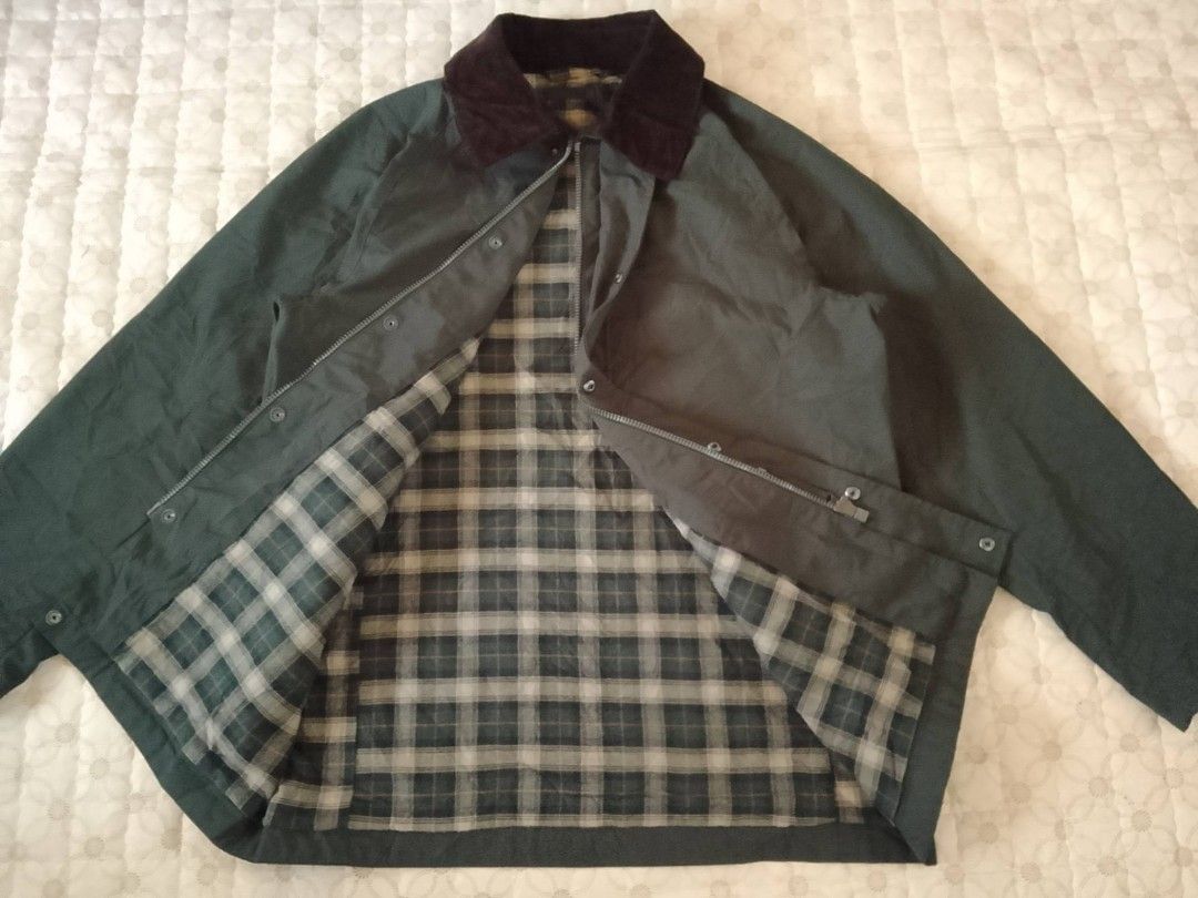 Uniqlo Olive Hunting Jacket Cords Collar (Category: Coats, Jackets and Outerwear) located in Zamboanga. Submitted by nurbya898048 (Listing ID 1463390724, Image 2). Description: - Classic dark green jacket - Corduroy collar - Plaid lining - Two front pockets with button closure - Snap button front - Ideal for cooler weather - Versatile style Tag size medium Width 22 Length 29 Excellent condition Presentable, no flaws Check all photos for details 1