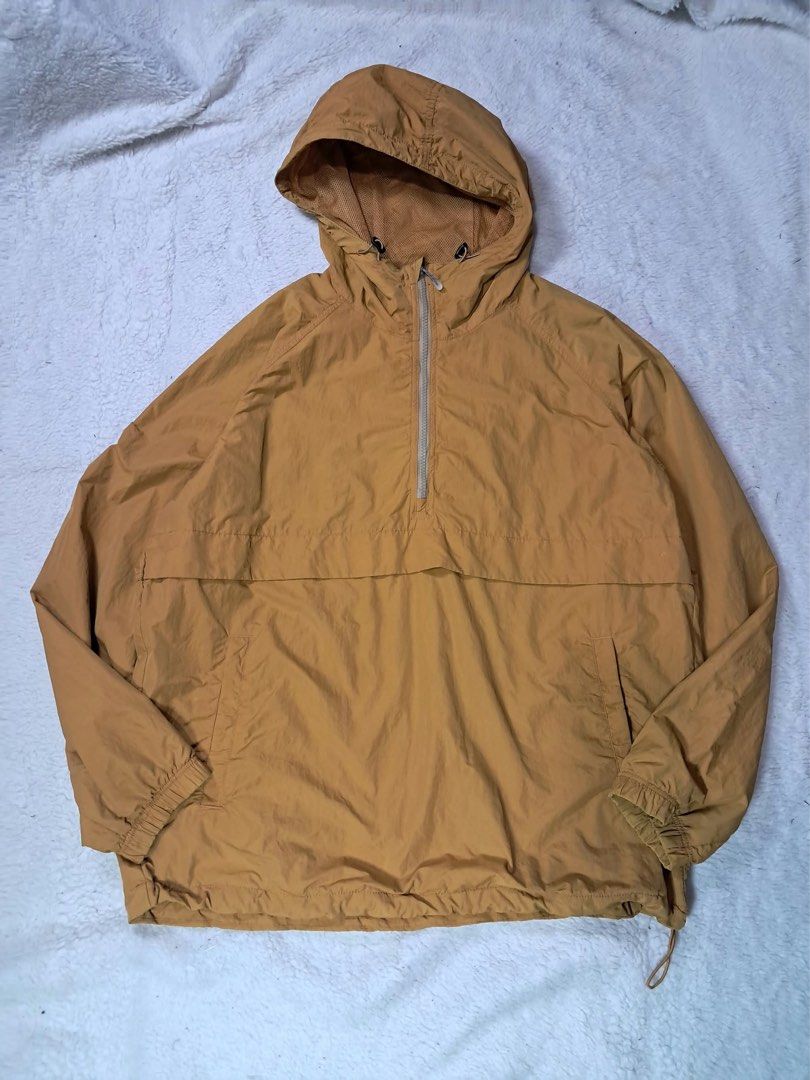 Uniqlo Oversized Anorak Parka Jacket Yellow Medium (Category: Coats, Jackets and Outerwear) located in Baguio. Submitted by padisellsz (Listing ID 1463449640, Image 3). Description: - Uniqlo Oversized Anorak Parka - Very good condition - No issues - Color: parang brown orange - Size: Medium - Features: Hood, half-zip closure, front pockets, drawstring hem - Material: 100% Nylon shell, 100% Polyester lining - Ideal for layering - mejo mahigpit lan