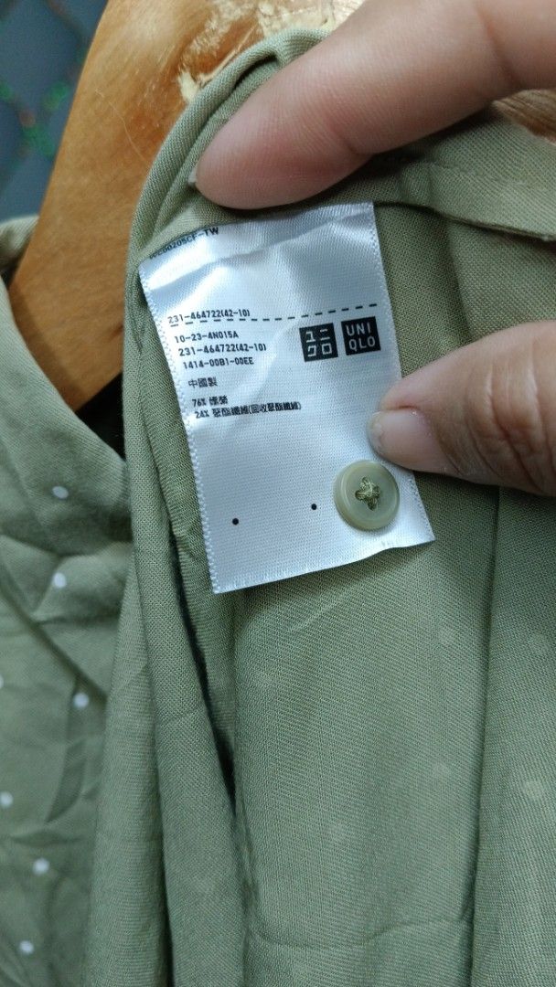 Uniqlo Polka Dot Short Sleeve (Category: Shirts) located in Manila. Submitted by zariyah.1986 (Listing ID 1463329686, Image 3). Description: - Uniqlo Short Sleeve Shirt - Size: XL - Color: Green with white polka dots - Style: Button-up front - Origin: Made in China - Perfect for casual wear.