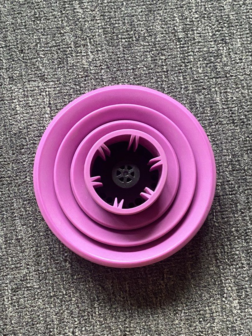 Universal Collapsible Diffuser Attachment (Category: Hair) located in Makati City. Submitted by clutterfree.life (Listing ID 1463389004, Image 3). Description: - Purple hair dryer diffuser attachment - Fits most standard hair dryers - Creates volume and reduces frizz - Collapsible design for easy storage and travel - Ideal for curly or wavy hair Used only twice. .