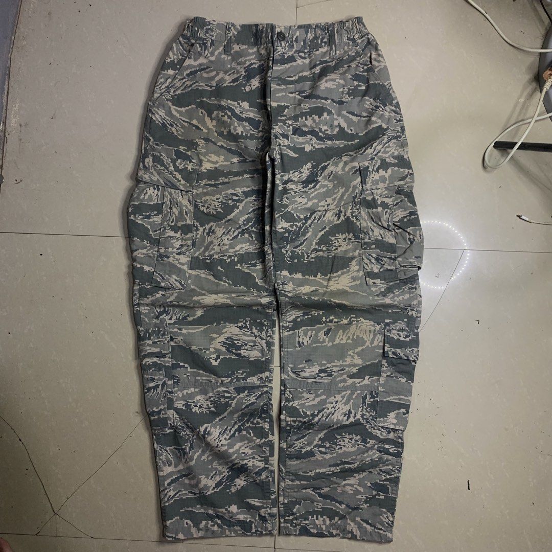US Air Force Camo Cargo Pants (Category: Jeans) located in Alaminos. Submitted by jikstocks (Listing ID 1463484662, Image 2). Description: - Genuine U.S. Air Force issue - Classic tiger stripe camouflage pattern - Multiple spacious cargo pockets - Made with durable, long-lasting material - Ideal for outdoor adventures or everyday casual style.