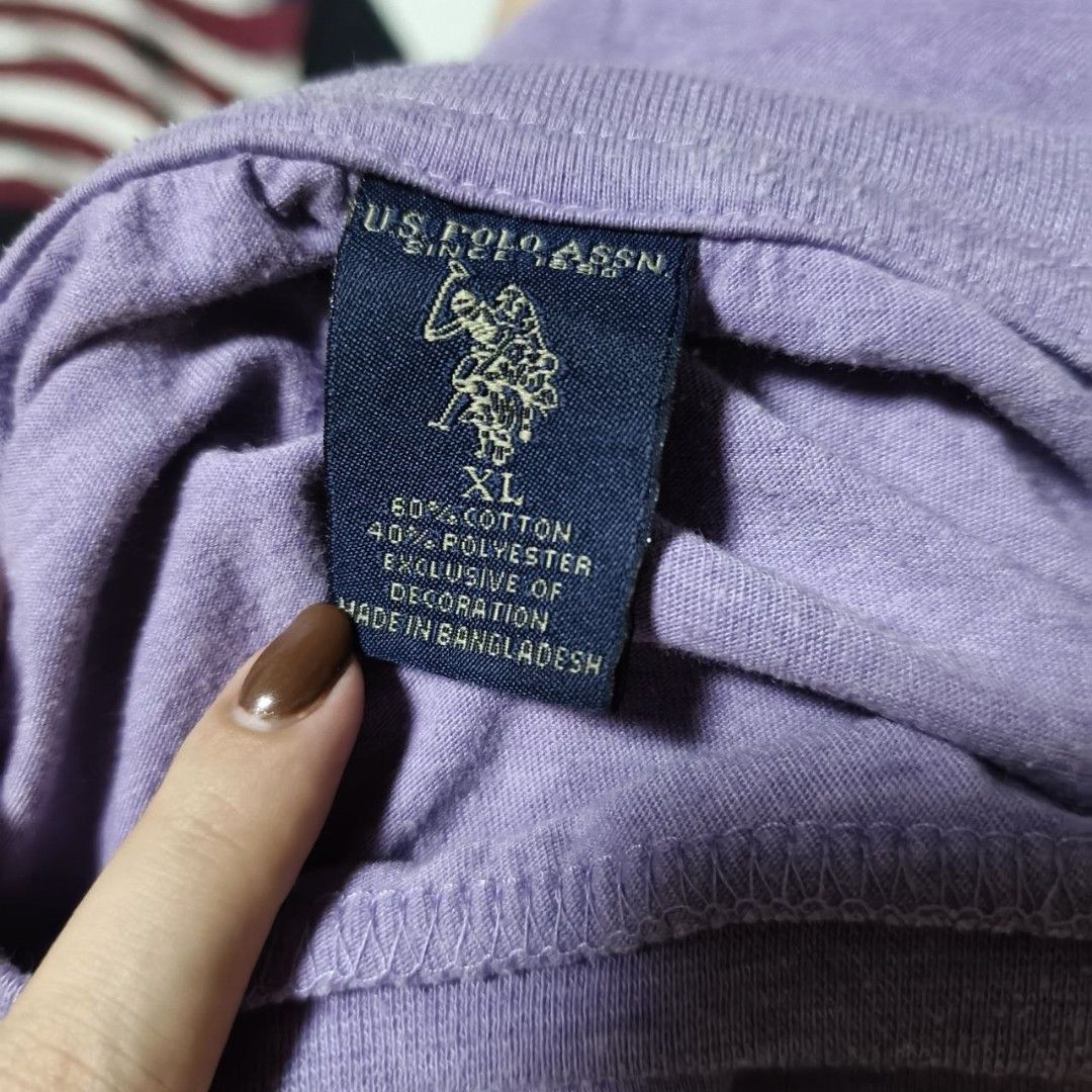 US Polo Assn Purple Tee (Category: Tshirts & Polo Shirts ) located in Quezon City. Submitted by rodthrift00 (Listing ID 1463368782, Image 3). Description: Best Fit: L-XL Dimension(WxL) : 23x30 Condition: 10/10 Issue: NA.