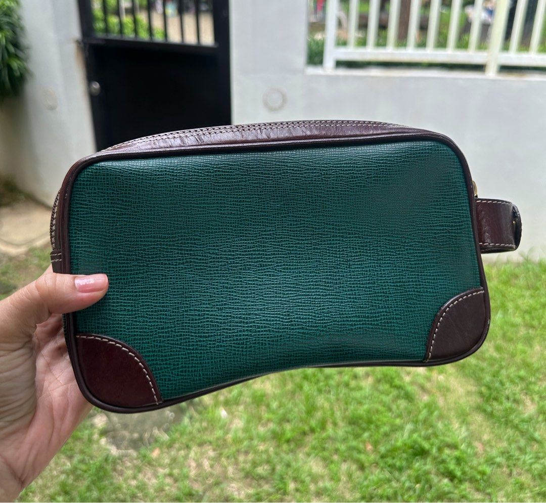 Valentino Primiero Clutch (Category: Belt bags, Clutches and Pouches) located in Bulacan. Submitted by thriftbagcollections (Listing ID 1463394755, Image 2). Description: Valentino Primiero Clutch 🤎💚 Excellent condition!Approx:H-5.5”W-9.2”D-3”.