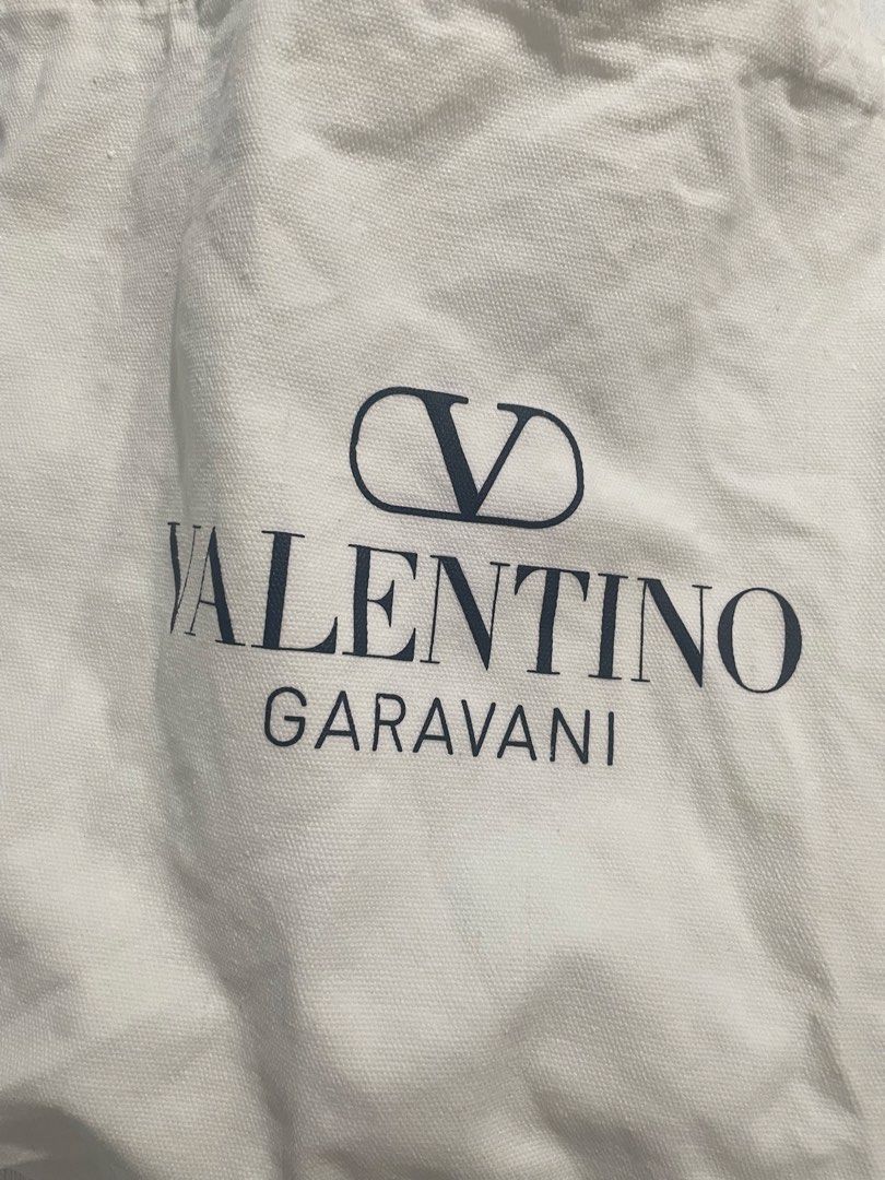 Valentino tote canvas bag (Category: Luxury Bags & Wallets) located in Davao. Submitted by mj_designervintagecurator (Listing ID 1463360622, Image 3). Description: 📌In good condition no holes on edges 📌15 inches length / 14 width.