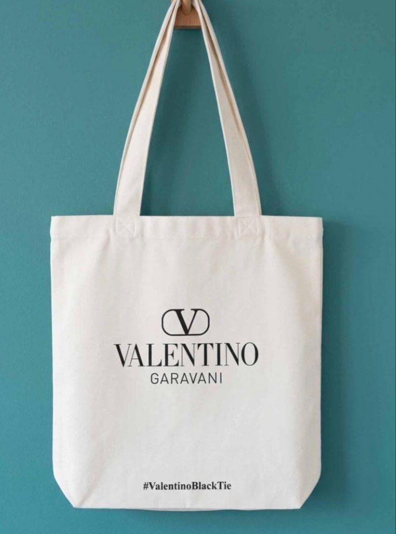 Valentino tote canvas bag (Category: Luxury Bags & Wallets) located in Davao. Submitted by mj_designervintagecurator (Listing ID 1463360622, Image 1). Description: 📌In good condition no holes on edges 📌15 inches length / 14 width.
