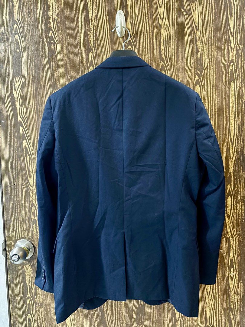 Van Heusen Navy Blazer (Category: Coats, Jackets and Outerwear) located in Makati City. Submitted by closet_by_mka (Listing ID 1463518263, Image 3). Description: Van Heusen Navy Blazer ✨ Classic, timeless piece in great condition! A staple blazer that’s super easy to dress up or down. 💙 Perfect for work, events, meetings, or whenever you need that polished look. • Classic navy color • Notched lapel • Two-button closure • Front flap pockets • Siz