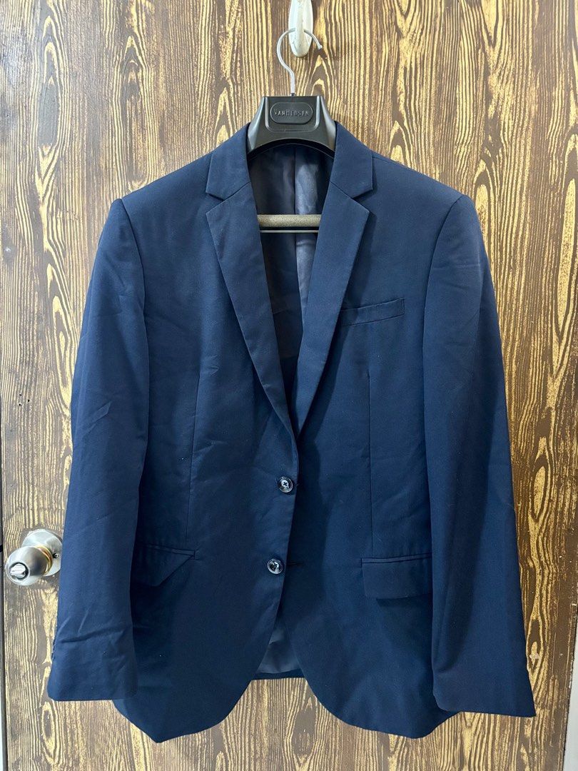 Van Heusen Navy Blazer (Category: Coats, Jackets and Outerwear) located in Makati City. Submitted by closet_by_mka (Listing ID 1463518263, Image 1). Description: Van Heusen Navy Blazer ✨ Classic, timeless piece in great condition! A staple blazer that’s super easy to dress up or down. 💙 Perfect for work, events, meetings, or whenever you need that polished look. • Classic navy color • Notched lapel • Two-button closure • Front flap pockets • Siz