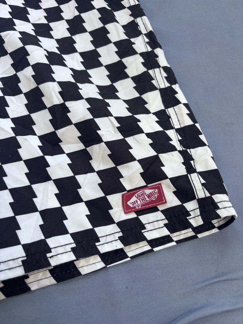Vans Checkerboard Board Shorts (Category: Shorts) located in Manila. Submitted by galitsabarat (Listing ID 1463406577, Image 3). Description: EXCELLENT CONDITION NO PINHOLES NEED WASH FRESH FROM BALE - Classic Vans checkerboard design - Black and white pattern - Comfortable drawstring waist - Secure velcro fly - Convenient cargo pocket on right leg - Ideal for beach, pool, or summer activities.