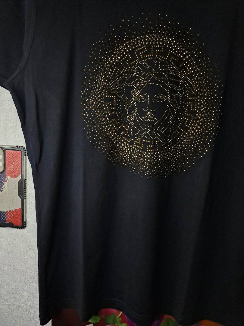 Versace Medusa Head (Category: Luxury Apparel) located in Quezon City. Submitted by yaseen73 (Listing ID 1463381124, Image 3). Description: Versace Embellished Medusa Motif Gold Toned Studded & and Crystal Logo Wearing Size : XL on Tag Dimensions : Please Refer to the Photo Color Rate : 9.9/10 Pristine Condition or Best Offer MOP : G C A S H B A N K T R A N S F E R Courier : J&T Lalamove Seller's Location : 📍Brgy. Pansol, Q.C.