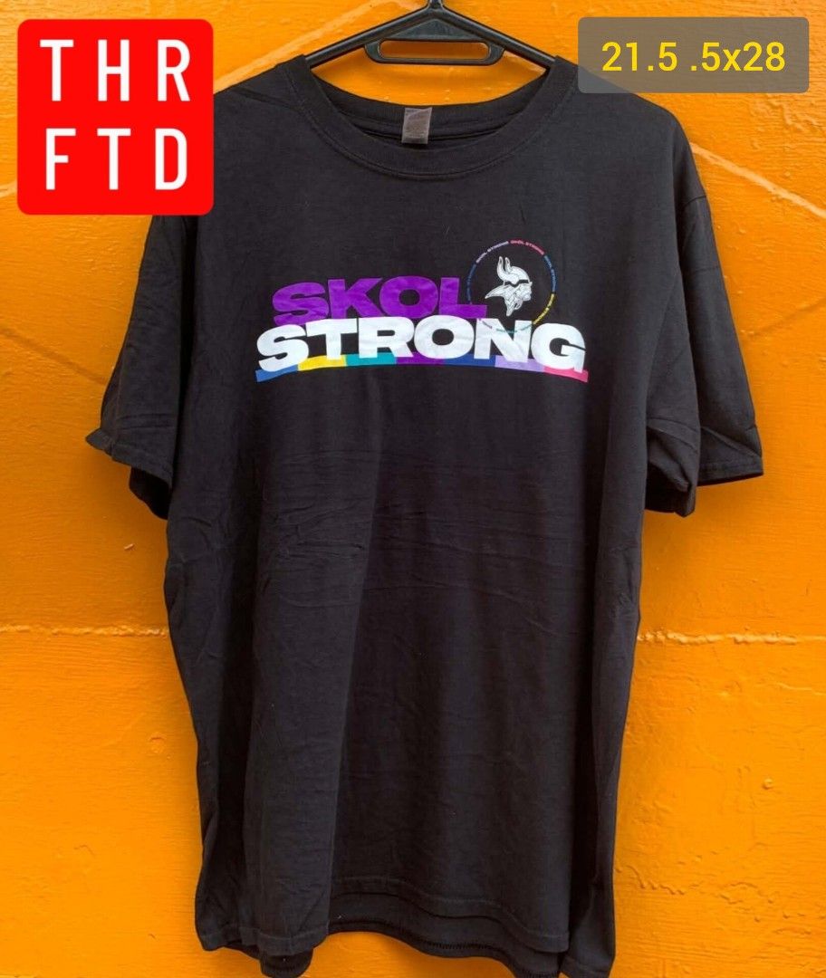 Vikings Skol Strong T-shirt (Category: Tshirts & Polo Shirts ) located in Pasig City. Submitted by ianovi (Listing ID 1463403373, Image 2). Description: ♻️ THRFTD Vikings Skol Strong shirt in black Large on tag 21.5 Width x 28 Length Very good condition! 350 + sf The Minnesota Vikings produced a limited-edition "SKOL STRONG" T-shirt for the 2021 Crucial Catch campaign, with proceeds benefiting the American Cancer Society. Availability: Limited st
