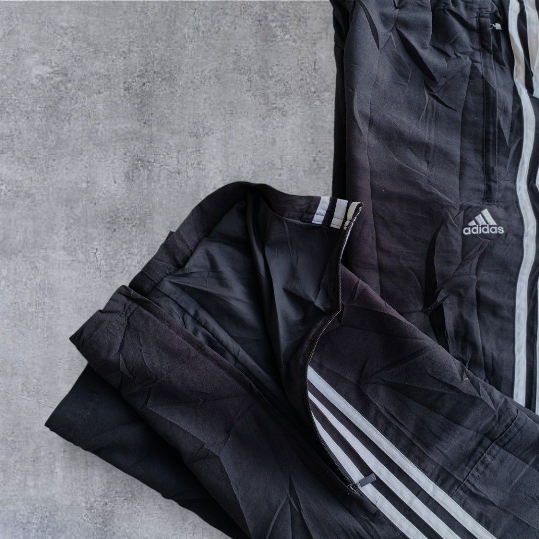 Vintage Adidas Trackpants Embroidered (Category: Activewear) located in Pasig City. Submitted by j.ownerss (Listing ID 1463491275, Image 3). Description: FOR SALE‼️ VINTAGE ADIDAS TRACKPANTS ‼️ ₱300 ONLY (FROM 350) Logo Embroidered 2 zip pockets Double lining With ankle zip Condition: 8/10 Flaws: stitching on lace part and hole (not see-through since it is double lining, refer to last 2 slides) Waistline: 24-36 Length: 40 Hem: 9 Pickup: Allegra G