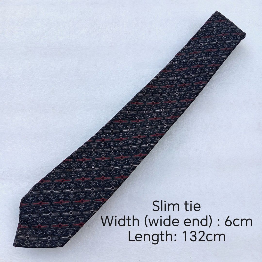 Vintage Dark Charcoal & Red Micro-Patterned necktie / tie (Category: Ties) located in Abucay. Submitted by gibzzz123 (Listing ID 1463374274, Image 2). Description: • All items are ON HAND and ready to be shipped/picked up. • Items are preloved/ukay, so please expect minimal signs of usage unless stated otherwise. • No major issues — good condition unless otherwise indicated in the listing. • Actual color may slightly vary due to lighting and scre