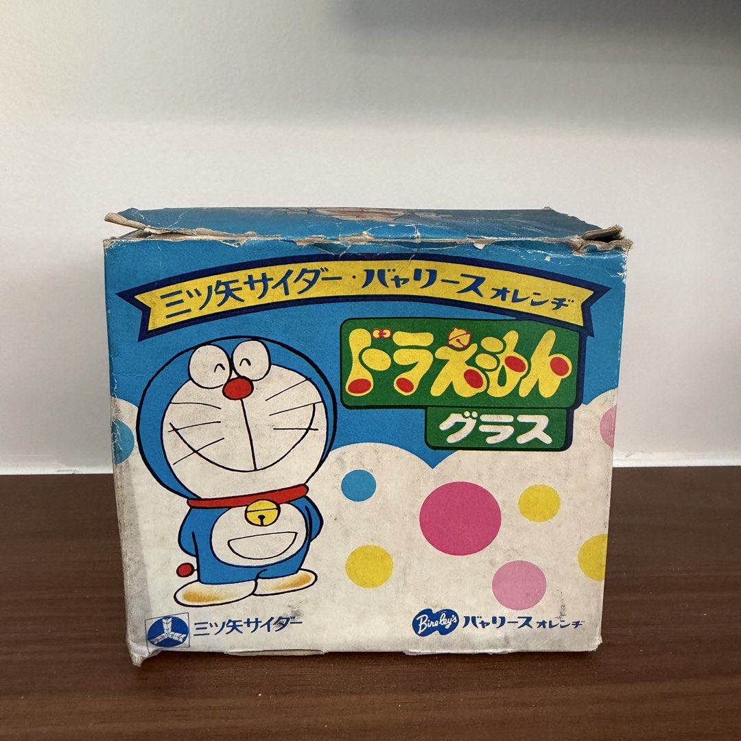 Vintage drinking glasses featuring Doraemon and Dorami-chan (Category: Vintage Collectibles) located in Bulacan. Submitted by prelovedetc (Listing ID 1463326651, Image 3). Description: This is a set of two 1980s vintage glasses Japanese promotional drinking glasses featuring Doraemon and Dorami-chan. They have a retro Showa-era feel and are recommended as collector's items. Brand new and comes with the original old box..
