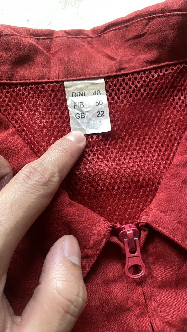 Vintage Red Utility Collared Zip-Up Vest (Category: Vests) located in Cabuyao City. Submitted by kekjct (Listing ID 1463398491, Image 3). Description: Condition: 9/10 (Minor fabric wear near zipper flap, no major flaws) Size: 24” Pit-to-Pit × 29” Length Color: Red / Crimson Details: • Collared neck design with two-way / dual zipper front closure • Hidden zippered side pockets with fabric storm flaps • Breathable mesh inner lining upper section • 