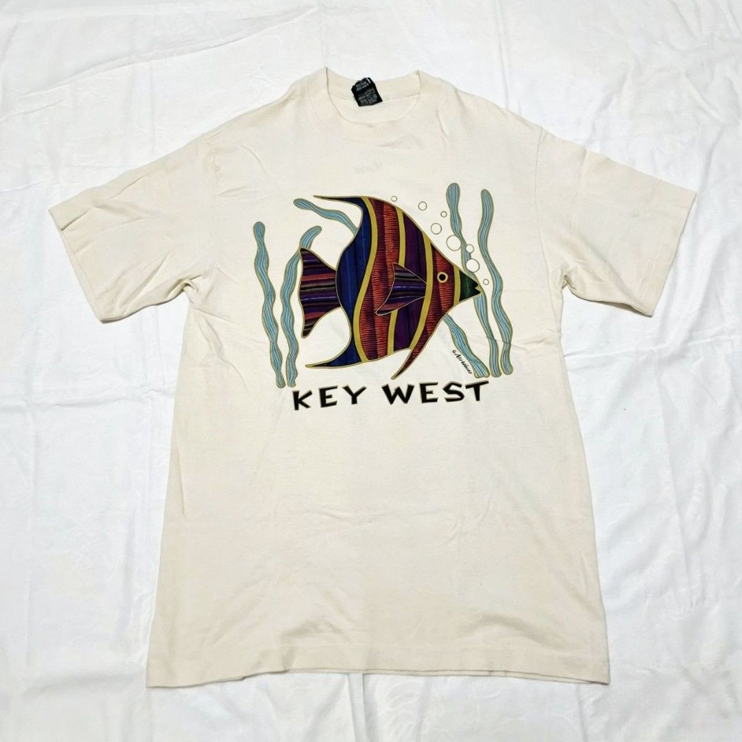 Vintage Stussy Key West Graphic tee (Category: Tshirts & Polo Shirts ) located in Quezon City. Submitted by rodthrift00 (Listing ID 1463370087, Image 1). Description: SINGLE STITCH ALL THE WAY Best Fit: L-XL Dimension(WxL) : 20x31 Condition: 10/10 Issue: Cut tag.