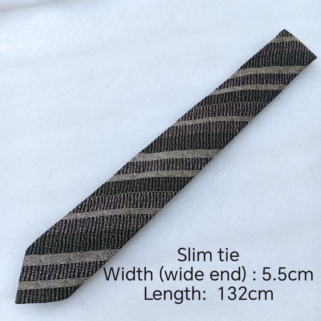 Vintage Textured Diagonal Striped necktie / tie (Category: Ties) located in Abucay. Submitted by gibzzz123 (Listing ID 1463374906, Image 2). Description: • All items are ON HAND and ready to be shipped/picked up. • Items are preloved/ukay, so please expect minimal signs of usage unless stated otherwise. • No major issues — good condition unless otherwise indicated in the listing. • Actual color may slightly vary due to lighting and screen setting