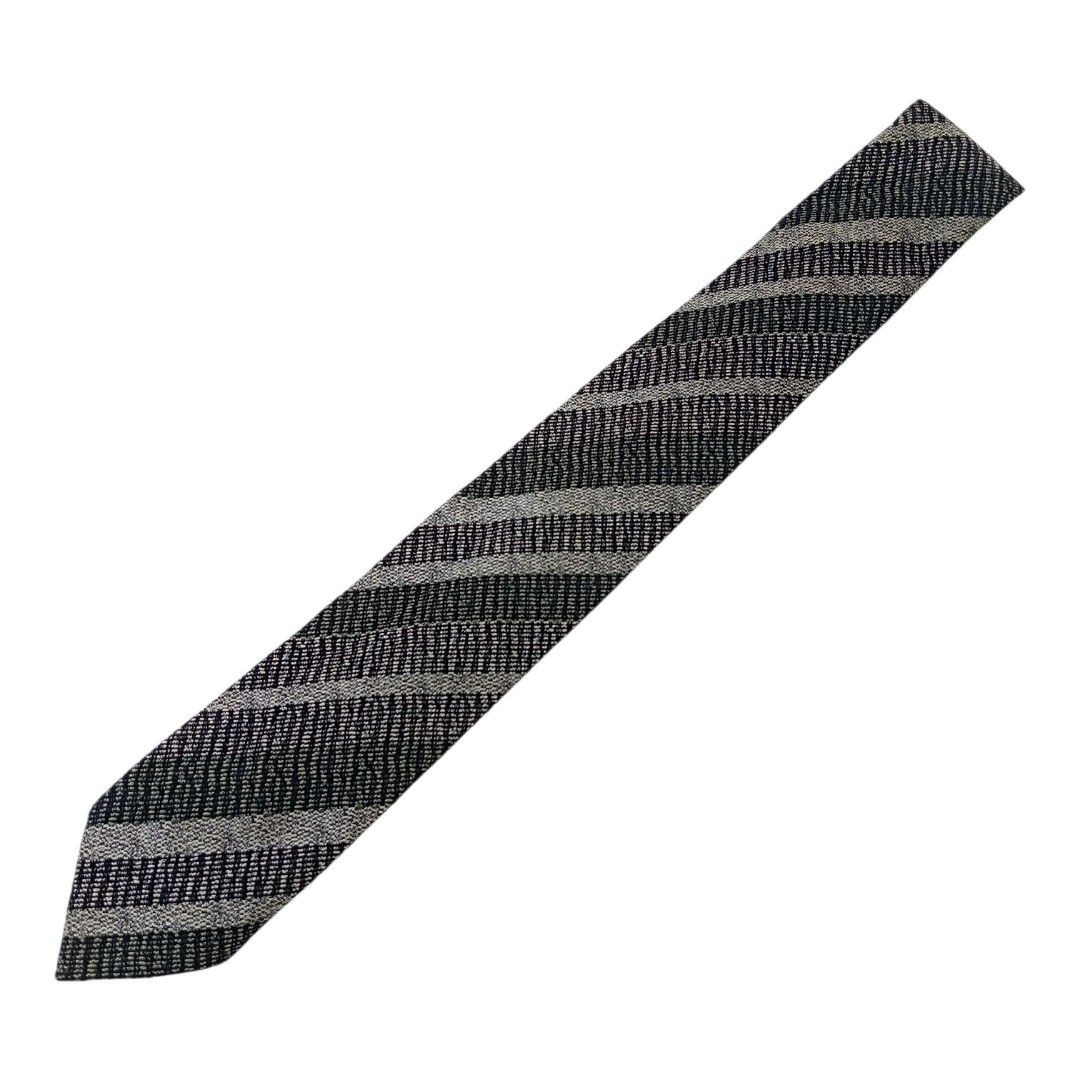 Vintage Textured Diagonal Striped necktie / tie (Category: Ties) located in Abucay. Submitted by gibzzz123 (Listing ID 1463374906, Image 1). Description: • All items are ON HAND and ready to be shipped/picked up. • Items are preloved/ukay, so please expect minimal signs of usage unless stated otherwise. • No major issues — good condition unless otherwise indicated in the listing. • Actual color may slightly vary due to lighting and screen setting