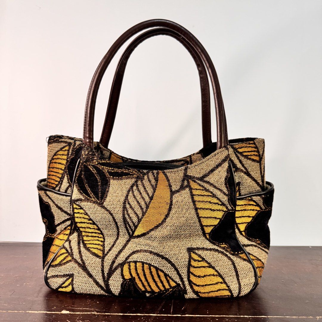 Vintage-Style Tapestry Shoulder Handbag (Category: Tote Bags) located in Bulacan. Submitted by orangepixiestixgirl (Listing ID 1463469964, Image 1). Description: ‼️message me on ig, @orangepixiestixgirl for inquiries and transactions‼️ ‼️CAN’T REPLY HERE‼️ Vintage-Style Tapestry Shoulder Handbag Dimensions: Height—16cm Width— 30cm Notes: Secondhand bags from Japan surplus. Please manage your expectations, may have signs of use and minor imperfect