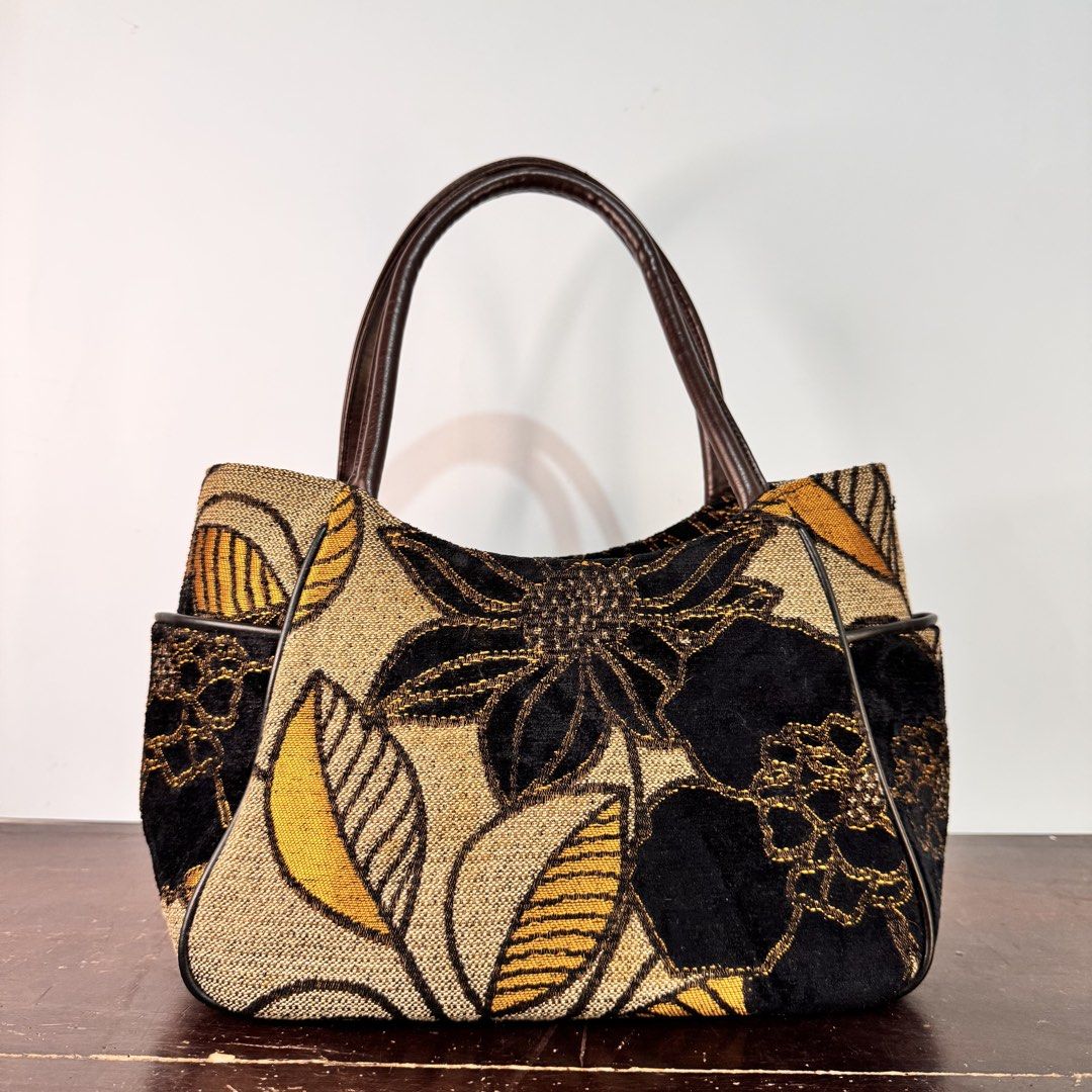 Vintage-Style Tapestry Shoulder Handbag (Category: Tote Bags) located in Bulacan. Submitted by orangepixiestixgirl (Listing ID 1463469964, Image 2). Description: ‼️message me on ig, @orangepixiestixgirl for inquiries and transactions‼️ ‼️CAN’T REPLY HERE‼️ Vintage-Style Tapestry Shoulder Handbag Dimensions: Height—16cm Width— 30cm Notes: Secondhand bags from Japan surplus. Please manage your expectations, may have signs of use and minor imperfect