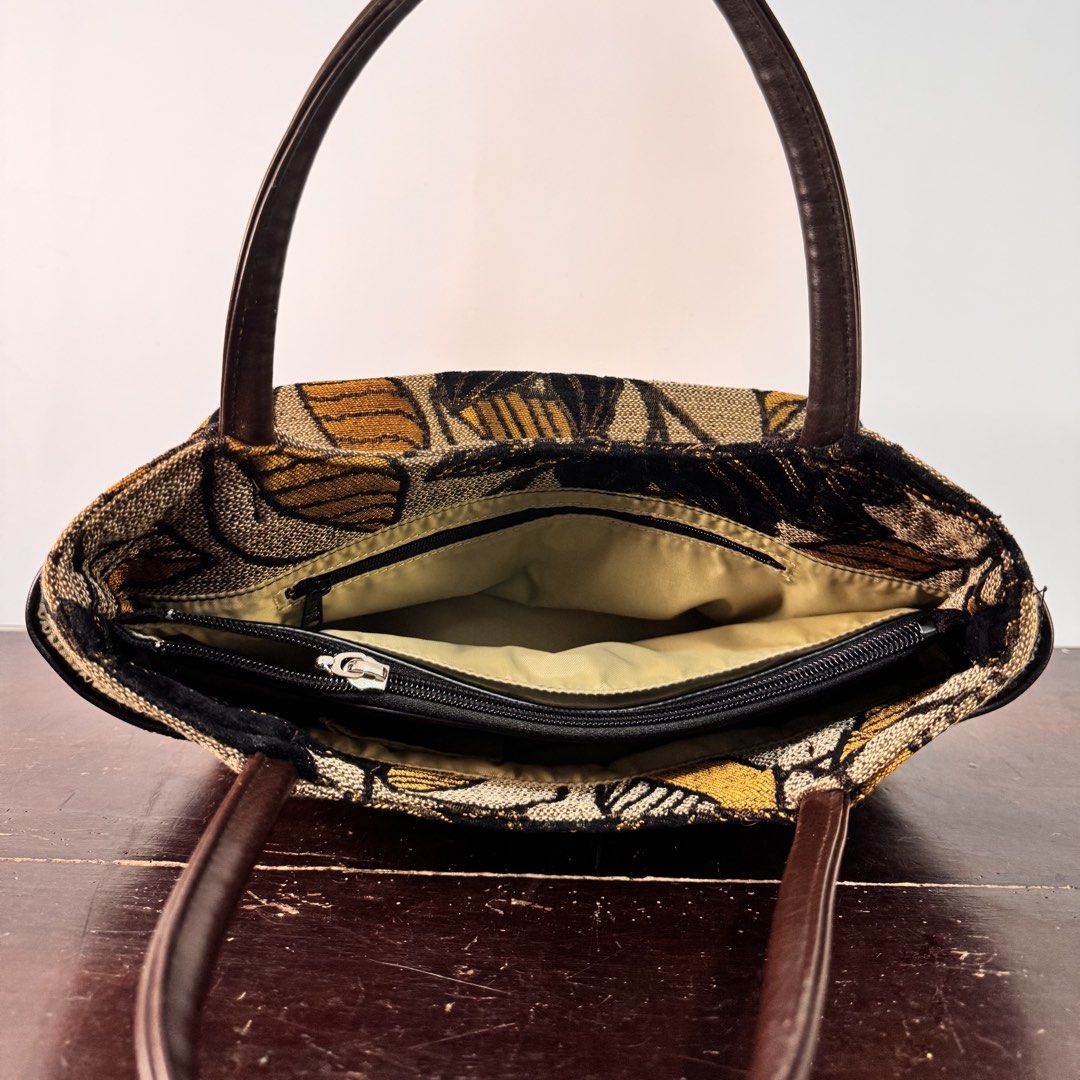 Vintage-Style Tapestry Shoulder Handbag (Category: Tote Bags) located in Bulacan. Submitted by orangepixiestixgirl (Listing ID 1463469964, Image 3). Description: ‼️message me on ig, @orangepixiestixgirl for inquiries and transactions‼️ ‼️CAN’T REPLY HERE‼️ Vintage-Style Tapestry Shoulder Handbag Dimensions: Height—16cm Width— 30cm Notes: Secondhand bags from Japan surplus. Please manage your expectations, may have signs of use and minor imperfect
