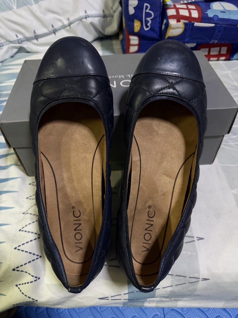 Vionic Desiree Quilted Navy Blue Leather Flats Size 8 (Category: Flats & Sandals) located in Pasig City. Submitted by aprilluxcloset0812 (Listing ID 1463479183, Image 1). Description: - Brand: Vionic - Model: Desiree - Color: Navy Blue - Material: Quilted Leather - Size: 8 US / 6 UK / 39 EU - Fit: Wide - Condition: New with original box - Features: Comfortable and stylish for everyday wear - Origin: Made in China RFS: decluttering EVERYTHING MUST