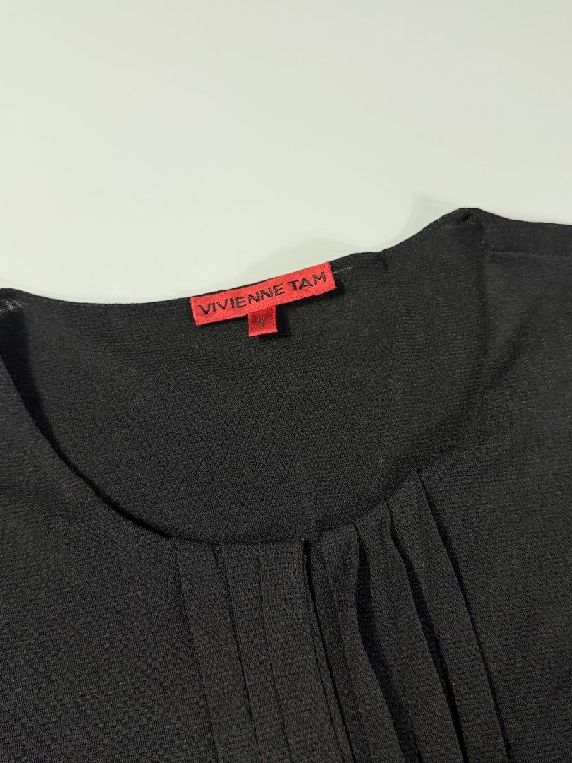 Vivienne Tam Pleated Blouse Black (Category: Blouses) located in Manila. Submitted by whowearsstreetwear (Listing ID 1463516547, Image 3). Description: Vivienne Tam Pleated Blouse Tee Black - Size: Small on tag (measurements in inches) W - 17 L - 25 Condition: Very Good Flaw/s: check last pic + shipping fee Location: Manila (Near UST).