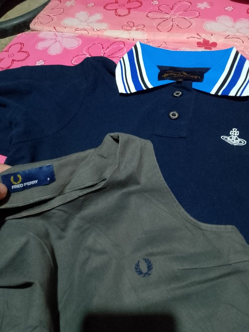 Vivienne Westwood & Fred Perry Dresses (Category: Dresses) located in Iloilo. Submitted by janillthrifted (Listing ID 1463449526, Image 2). Description: - Navy blue polo dress with Vivienne Westwood orb logo and striped collar. - Grey sleeveless maxi dress with Fred Perry laurel wreath logo and side slit. - Both are ideal for casual everyday wear..
