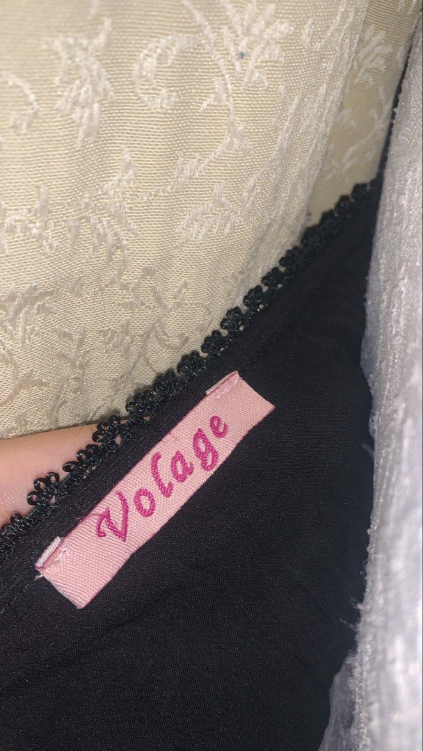 Volage Black Lace Sequin Camisole Top (Category: Sleeveless) located in Dagupan City. Submitted by sj_styles0910. (Listing ID 1463531767, Image 3). Description: - Brand: Volage - Color: Black - Style: Camisole top - Features: Delicate lace trim, sequin details, ribbon accents - Fabric: Sheer - Hem: Scalloped lace - Straps: Adjustable spaghetti straps - Versatile: Great for layering or wearing solo.