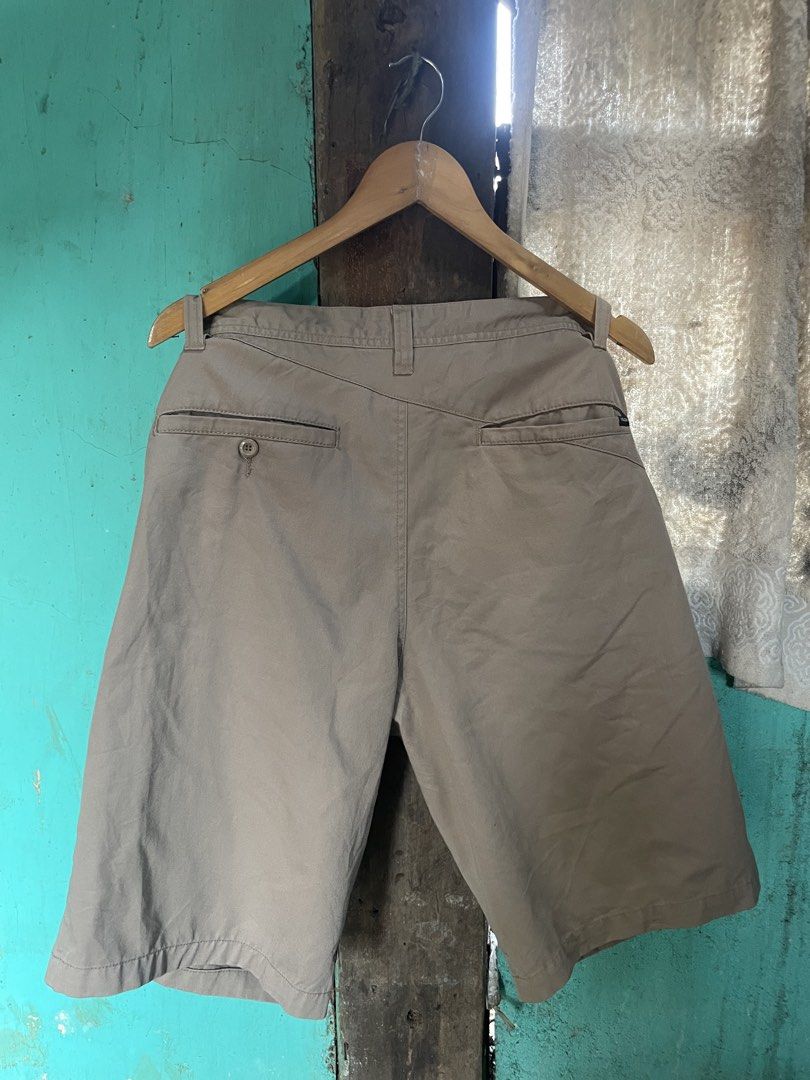 Volcom Khaki Chino Shorts Size 32 (Category: Shorts) located in Manila. Submitted by fivethreefinds (Listing ID 1463459439, Image 2). Description: - Volcom khaki chino shorts - Size: 32 waist - Fit: Classic, suitable for everyday wear - Pockets: Front and back - Closure: Button and zip - Detail: Small embroidered Volcom logo on the left leg.