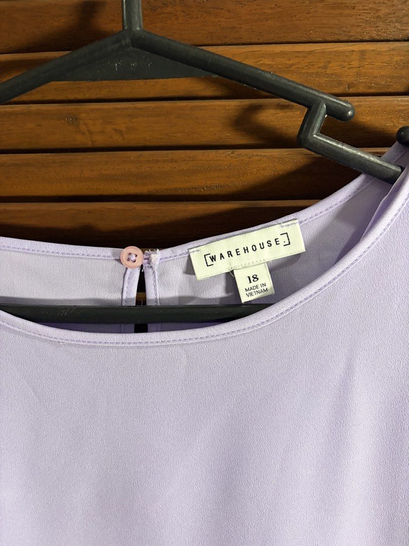 Warehouse Lilac Cap Sleeve Top Size 18 (Category: Blouses) located in Quezon City. Submitted by offload.rpl (Listing ID 1463381247, Image 2). Description: - Lovely lilac colour - Cap sleeves - Round neckline - Button closure at the back - Made in Vietnam - Size 18.