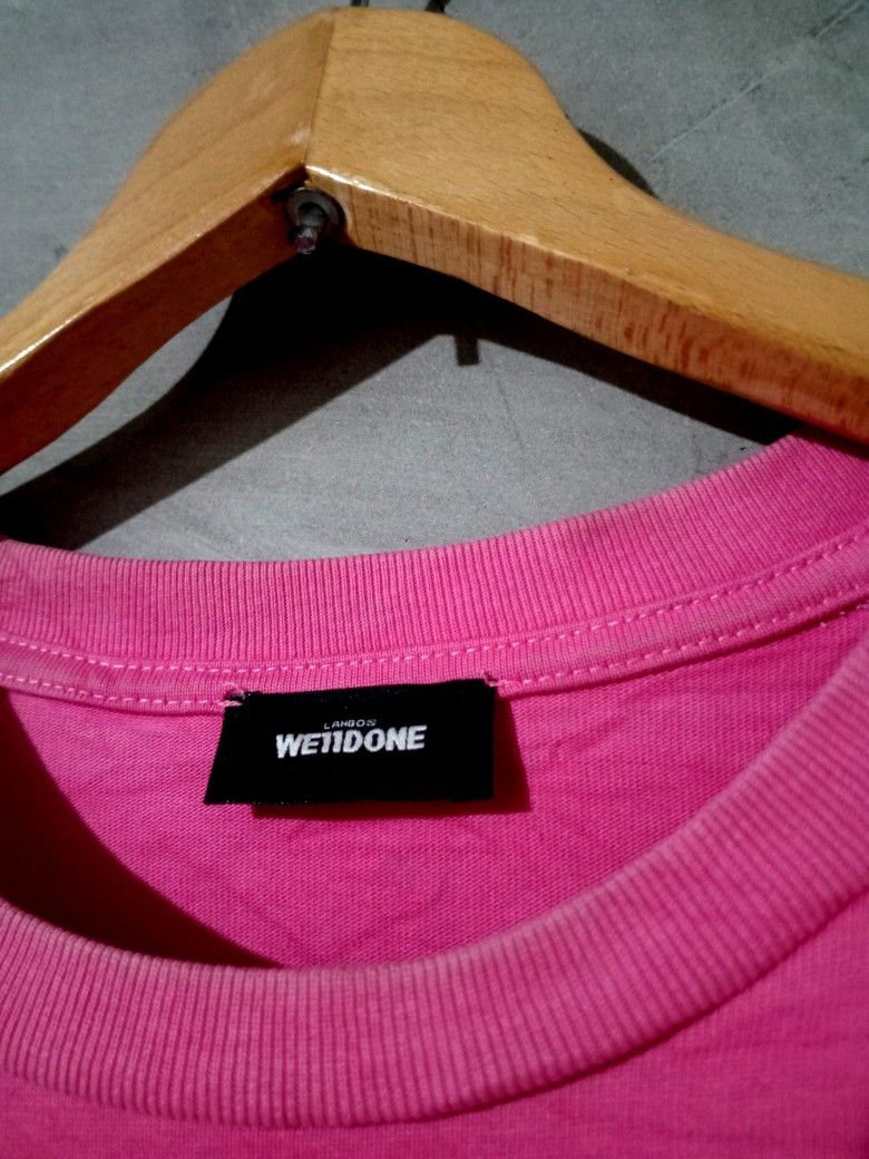 Welldone Men's Tshirt (Category: Tshirts & Polo Shirts ) located in Manila. Submitted by boldfalcon.38de78 (Listing ID 1463553445, Image 3). Description: A pink We11done oversized logo-print T-shirt featuring a stacked black graphic logo across the front Welldone as new Condition Size M W -23.5 ' L - 29.5 9.9/10 color rate no issue location Davao city Gcash payment J&T Courier php 580 + sf DM 💌.