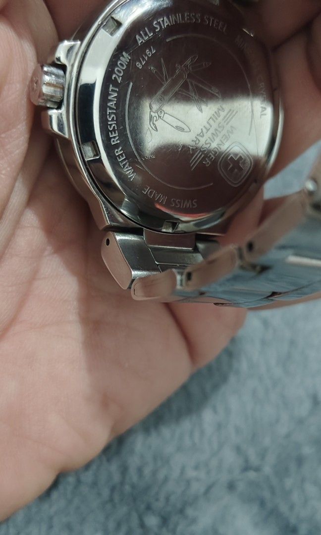 Wenger Swiss Military (Category: Men's Watches) located in Cebu City. Submitted by aceoftime (Listing ID 1463524158, Image 3). Description: In good working condition Swiss Made Analog quartz with date display Blue dial in stainless steel case & bracelet 200m water resist Watch only Our Guarantee: 💯 Authentic All watches are checked by our experienced technician to ensure good functionality Please manage your expectations since these are preloved