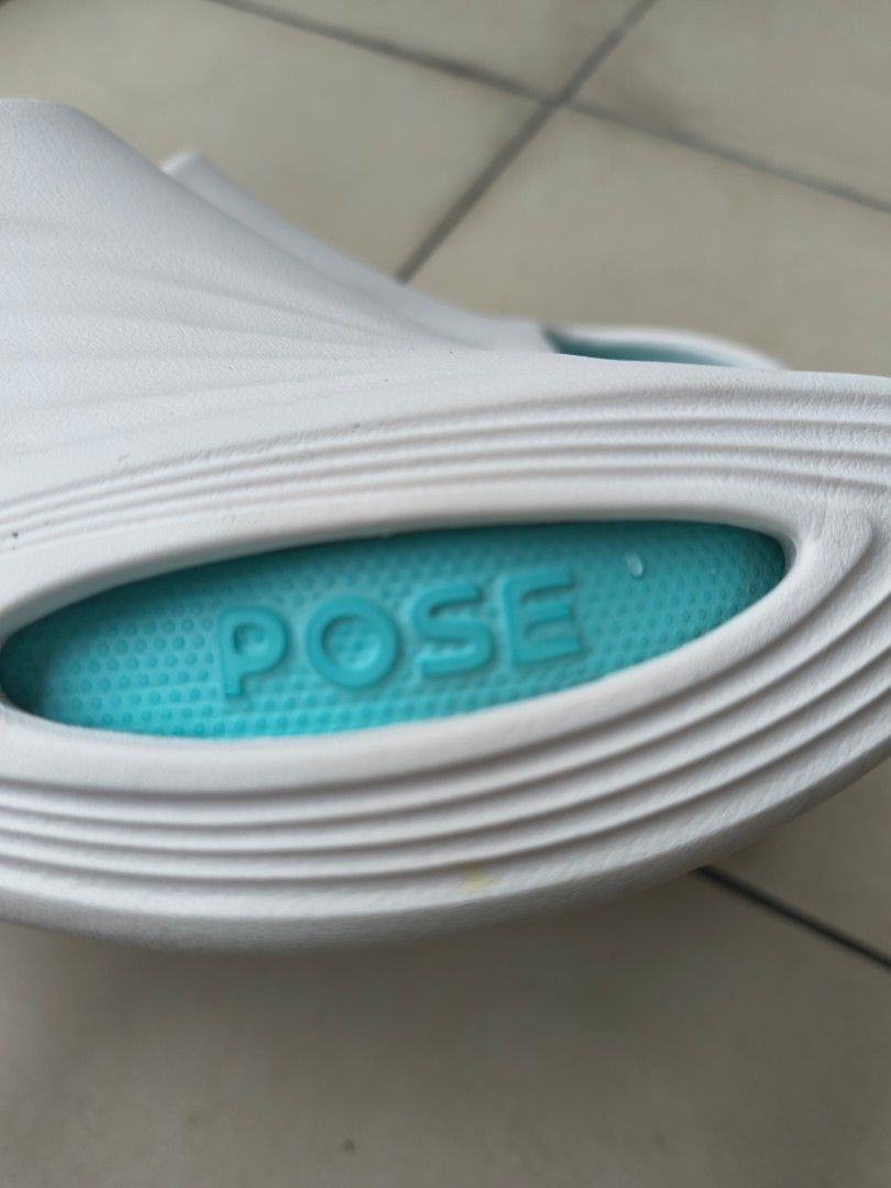White & Teal "POSE" Slides - Unisex (Category: Sneakers & Footwear) located in Manila. Submitted by hakunaematata (Listing ID 1463358370, Image 3). Description: - White slip-on slides - Teal footbed with textured pattern for comfort - Wavy design on the outer sole - Ideal for casual wear or after sports - See photos for measurements - Unisex.