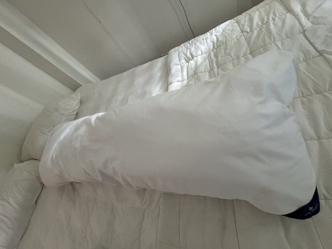 White Body Pillow (Category: Bedding & Towels) located in Manila. Submitted by decluterthings888 (Listing ID 1463335922, Image 1). Description: - Long white body pillow - Soft and comfortable - Ideal for sleeping or lounging .
