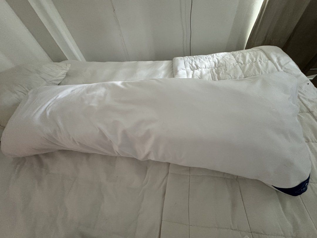 White Body Pillow with Pillowcase (Category: Bedding & Towels) located in Manila. Submitted by decluterthings888 (Listing ID 1463336013, Image 3). Description: - Long white body pillow - Perfect for sleeping, lounging, or back support. - Soft and comfortable material. .