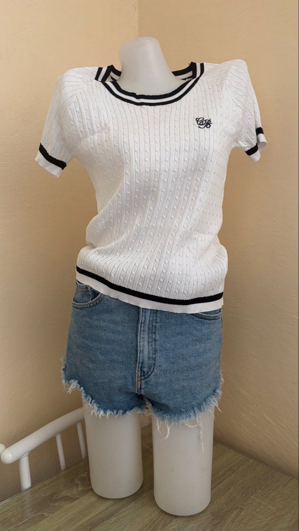 White Cable Knit Top with Black Trim (Category: Blouses) located in Santa Cruz. Submitted by homedecluttersale (Listing ID 1463526046, Image 1). Description: • Unused • Fits Medium to Large • In excellent condition • Photos taken using mannequin only 🚚 Shipping via J&T only 📦 Shipping fee to be shouldered by buyer 💳 Mode of payment: GCash 📍 Santa Cruz, Laguna.