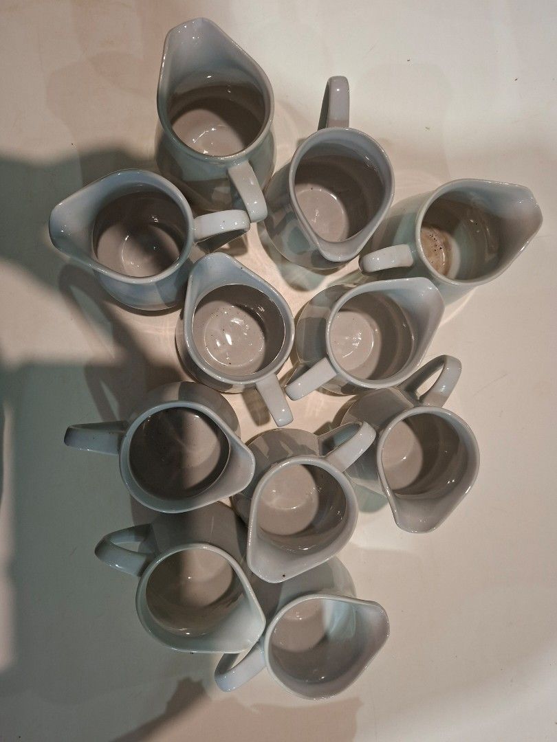 White Ceramic Creamer Pitchers Set (Category: Coffee & Tea Tableware) located in Bulacan. Submitted by samaraullo81159 (Listing ID 1463433041, Image 3). Description: 11 pieces, plain white ceramic. Good for coffee/milk creamer, syrup, sauces, café/restaurant use, catering or events. Good condition..