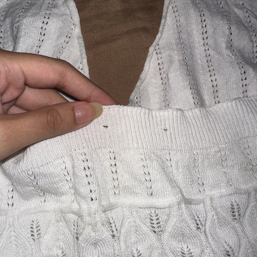 White Crochet Halter Top Cover Up (Category: Sleeveless) located in Manila. Submitted by daintywears (Listing ID 1463345224, Image 3). Description: manage your expectations this is a thrifted item. flaw: meron lang minor hole sa back but not noticeable at all. see photos - White crochet halter top - Sweetheart neckline with tie closure - Ribbed band under bust - Open knit pattern - Ideal for beach days or layering - Two small dark marks near neck