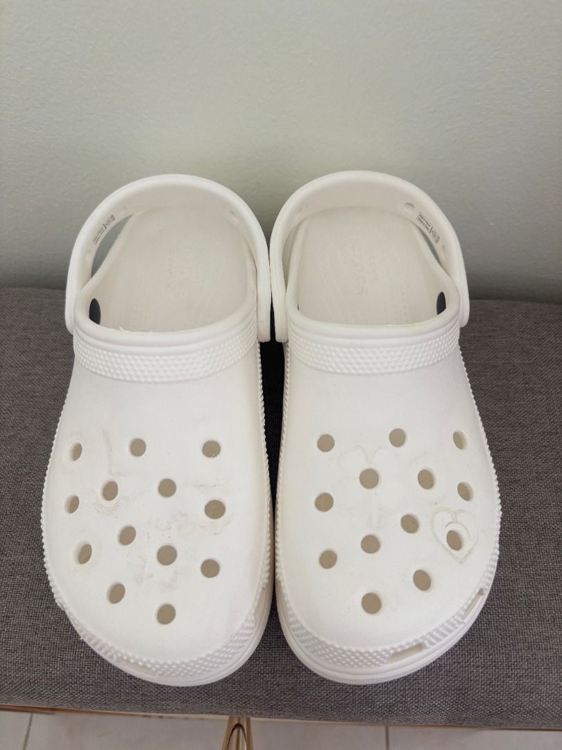White Crocs Platform Clogs (Category: Slippers and slides) located in Cebu City. Submitted by bml_vault (Listing ID 1463371799, Image 1). Description: M 4 | W 6 - White Crocs platform clogs - Classic design with pivoting heel strap - Easy to clean and comfortable for everyday wear - Light markings from Jibbitz, as shown in photos - Great for casual outings.