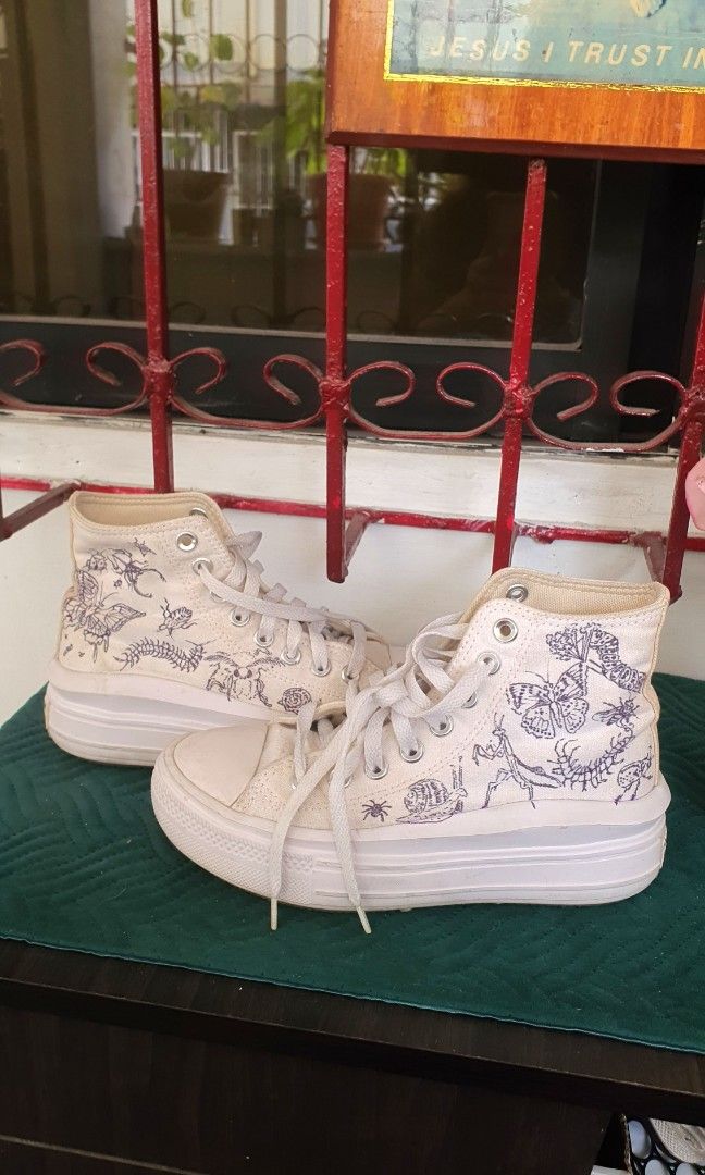 White Custom Converse Chuck Taylor All Star Platform High Tops (Category: Sneakers) located in Quezon City. Submitted by garagesaleanghel (Listing ID 1463369128, Image 1). Description: Size 5 original white converse chuck taylor all stars -Customized by me with insects art using sharpie 🦋 -Needs whitening and cleaning lang but no damage RFS: too many shoes, I prioritize running shoes na.