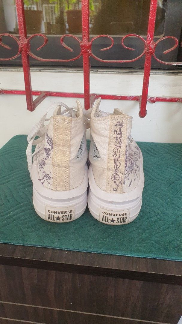White Custom Converse Chuck Taylor All Star Platform High Tops (Category: Sneakers) located in Quezon City. Submitted by garagesaleanghel (Listing ID 1463369128, Image 3). Description: Size 5 original white converse chuck taylor all stars -Customized by me with insects art using sharpie 🦋 -Needs whitening and cleaning lang but no damage RFS: too many shoes, I prioritize running shoes na.
