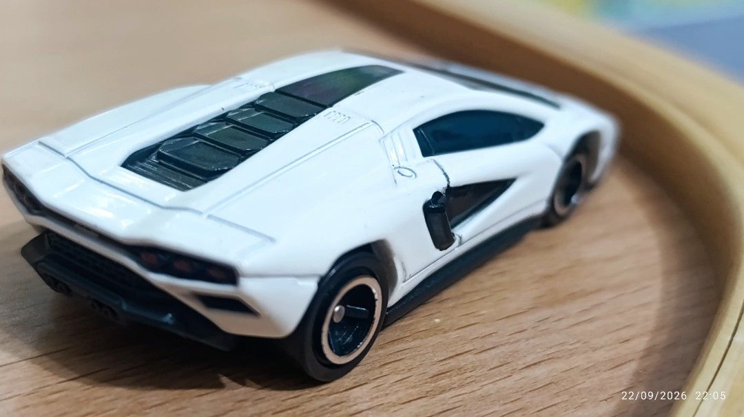 White Lamborghini Countach Toy Car (Category: Vehicle & Diecast Models) located in Quezon City. Submitted by manyigorot33447 (Listing ID 1463552311, Image 3). Description: - White Lamborghini Countach toy car - Detailed diecast model (similar to TOMICA) - Perfect for collectors and kids who love supercars - Suitable for display or play - Clean and ready for a new home AS IS WER IS.