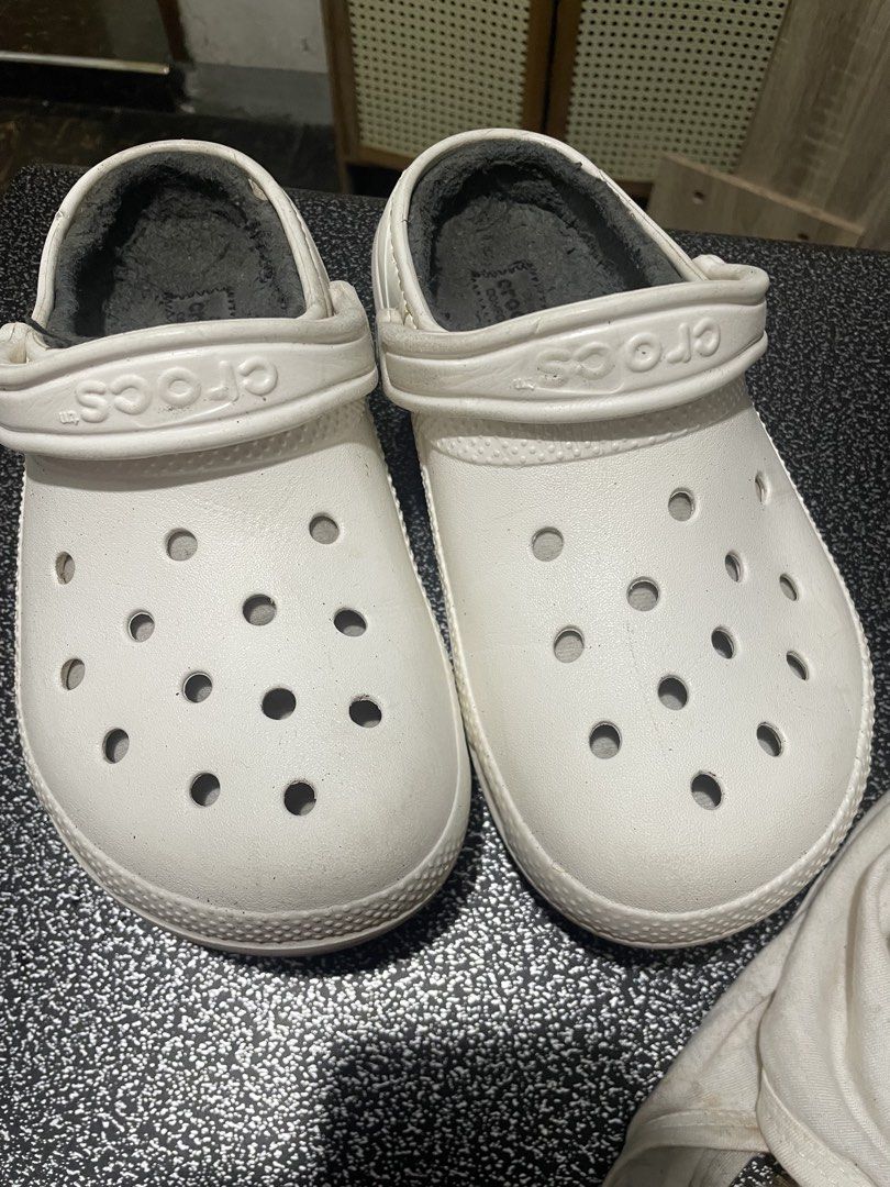 White Lined Crocs (Category: Slippers and slides) located in Cabanatuan. Submitted by yahna22 (Listing ID 1463552119, Image 1). Description: - White Crocs with soft grey lining for extra warmth. - Easy slip-on and off design. - Perfect for casual outings or lounging at home..