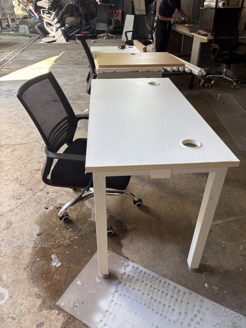 White Office Desk with Cable Holes (Category: Office Furniture & Fixtures) located in Valenzuela. Submitted by cha_leng.861 (Listing ID 1463407811, Image 2). Description: - Sleek white desk with sturdy metal legs. - Two convenient circular holes for effortless cable management. - Ideal for creating a functional home office or study space. - Simple and quick assembly process. - Compact design, perfect for maximizing small areas..